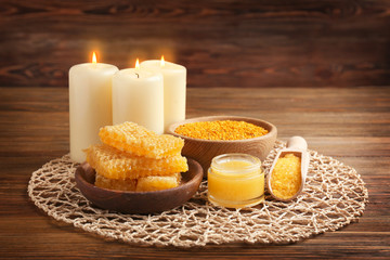 Honey spa set on wicker mat and wooden background