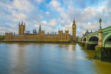 Fototapeta na wymiar The House of Parliament, Big Ben and Westminster Bridge in London, England