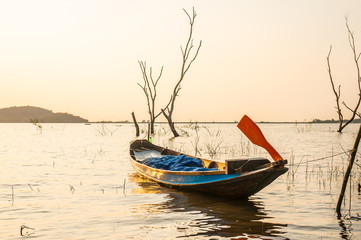 Naklejka na ściany i meble small fishing boat at Bang Phra Reservoir Sriracha,Chonburi, Thailand.