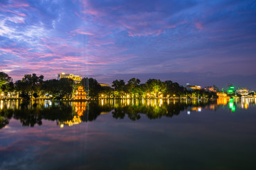 Fototapeta premium Hoan Kiem lake ( Ho Guom, Sword lake), the center of Hanoi capital, Vietnam at twilight.