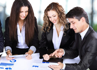 business, technology office concept - smiling female boss talking to business team