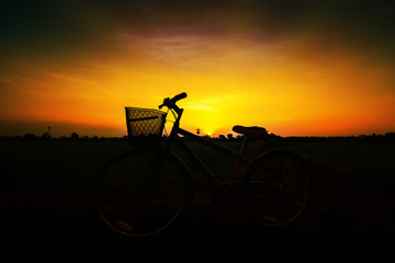 Fototapeta premium Silhouette of bicycle in sunset
