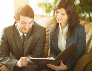 Image of business people listening and talking to their colleague at meeting