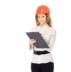 Woman engineer in a helmet with a folder in his hands