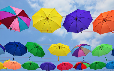 Colorful umbrellas background. Coloruful umbrellas urban street decoration.