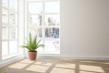 White empty room with winter landscape in window. Scandinavian interior design