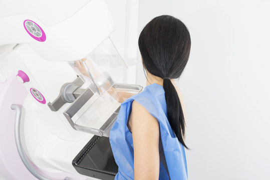 Woman Undergoing Mammogram X-ray Test In Hospital