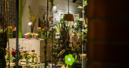 View inside flower shop at night time