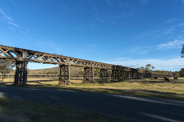 old railway bridge crossing Murrumbidgee River Gundagai New South Wales. Disused abandoned Copyspace.