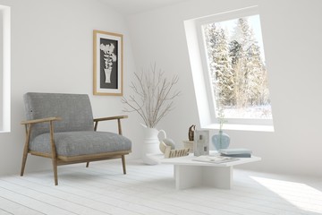 Fototapeta na wymiar White room with armchair and winter landscape in window. Scandinavian interior design