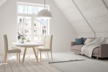 White room with sofa and winter landscape in window. Scandinavian interior design
