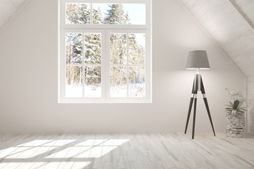 White empty room with lamp and winter landscape in window. Scandinavian interior design