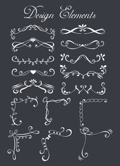 Set of hand drawn design elements (text dividers and corners) isolated on chalkboard.