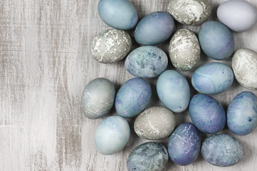 Fototapeta na wymiar Blue and gray Easter eggs