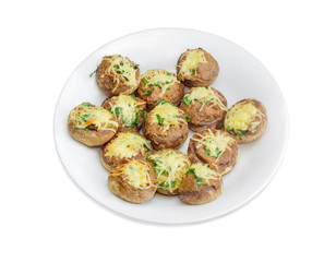 Stuffed button mushrooms on the white dish