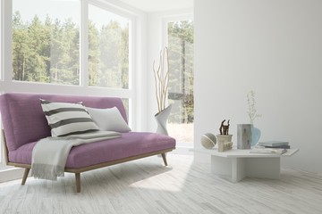 White room with sofa and green landscape in window. Scandinavian interior design