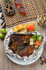 Naklejka na ściany i meble grilled arab fish