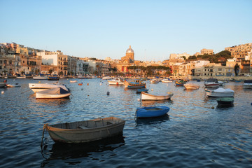Fototapeta premium The view of the Kalkara bay in the sunset light, Malta.