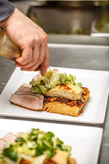 Chef decorating tenderloin