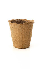 peat pot with soil for seedlings isolated on white background