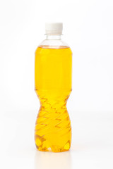 Sunflower oil in plastic bottle isolated on white background