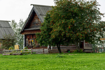 Old wooden rustic house a sunny summer day.