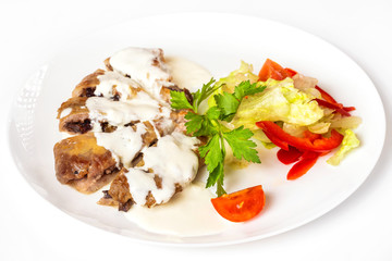 Plate of vegetables and meal of minced meat with mushrooms isolated at white background.