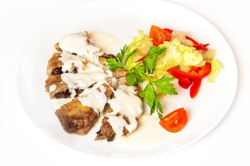 Plate of vegetables and meal of minced meat with mushrooms isolated at white background.