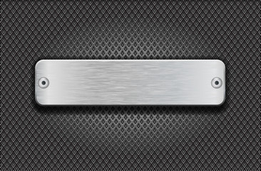 Metal brushed long plate on perforated background. Diamond shape holes