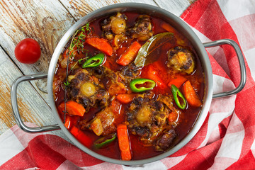 beef tail stew with vegetables, thyme, red wine