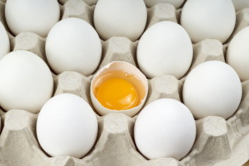 broken egg on the tray