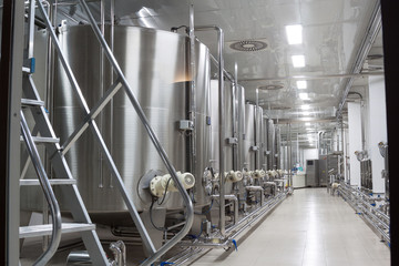 large metal vats for fermentation of wine factory