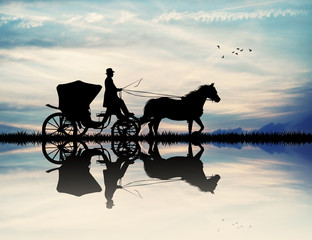 carriage with horse at sunset