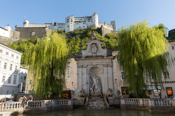 Fototapeta na wymiar View of the old Horse Well at the Kapitelplatz Square in Salzburg, Austria.