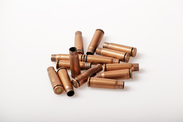 Close up of used Kalashnikov 7,62 mm cartridges on white