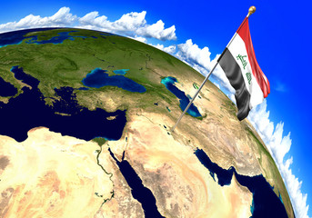 Iraq national flag marking the country location on world map. 3D rendering, parts of this image furnished by NASA