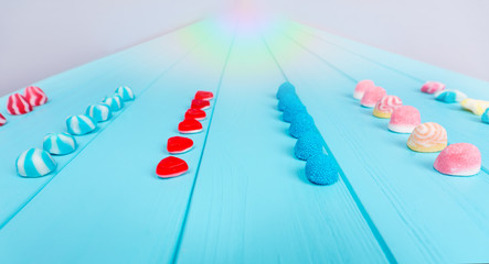 Close up of delicious jelly candies are placed exactly in the ranks