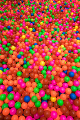 Fototapeta na wymiar Colorful plastic balls in children park