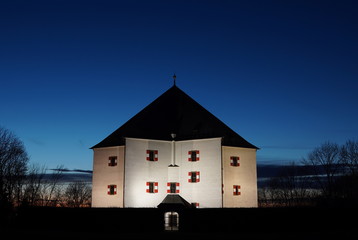 Fototapeta premium Famous landmark Letohradek Hvezda (chateau Star) on the White Hill in Prague, Czech Republic, during the sunset as a symbol of historical building in Eastern Europe 
