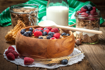 Tasty breakfast with milk and fruit.
