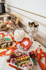 delicious colorful cookies and cakes on the wedding candy bar