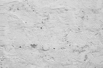 Wall fragment with scratches and cracks