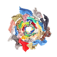 Top view to whirlwind of clothes isolated on white background