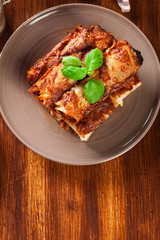 Baked cannelloni with minced meat and bechamel sauce on a plate