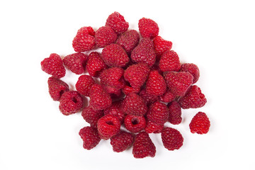 Fresh raspberry is isolated on a white background