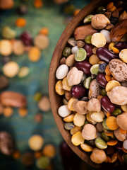 Raw legume on old rustic wooden table.