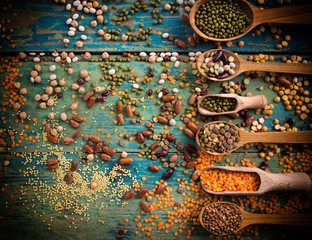 Raw legume on old rustic wooden table.