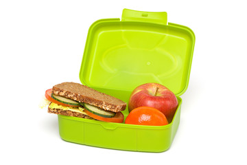 Healthy Green School Lunch Box, Isolated on White, with Whole-grain Bread and Fruit