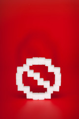 Obraz premium Sugar Shapes on Red - prohibition sign
