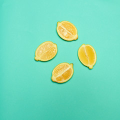Lemons on green background